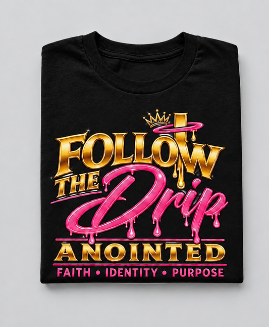 Black Follow The Drip Anointed tee on a grey background, landscape
